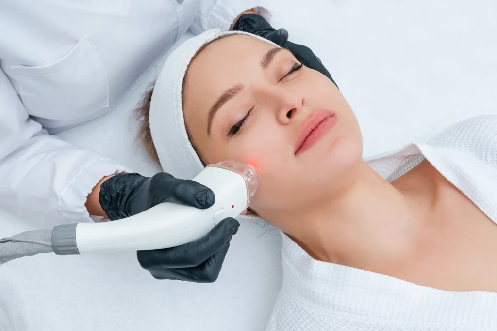 Woman receiving laser resurfacing treatment at Point of View Medical Aesthetics